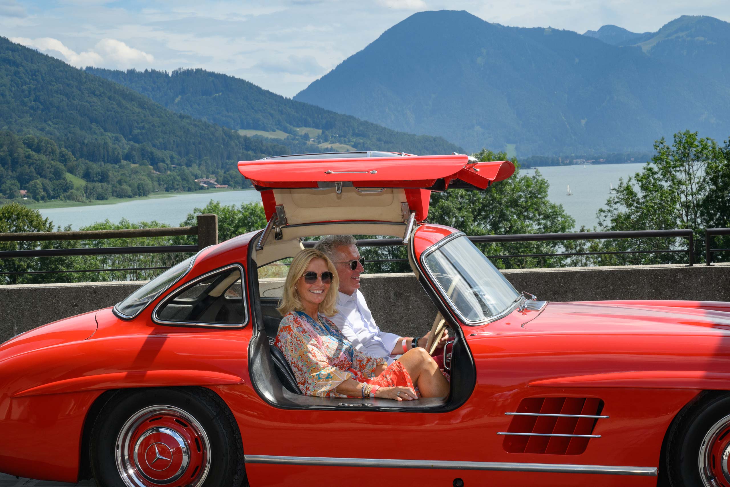 COEG Couple in Red Mercedes