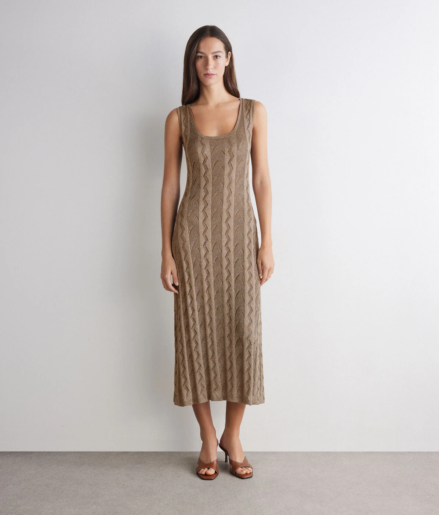 Dress with ribbed cable knit pattern and lamé yarn